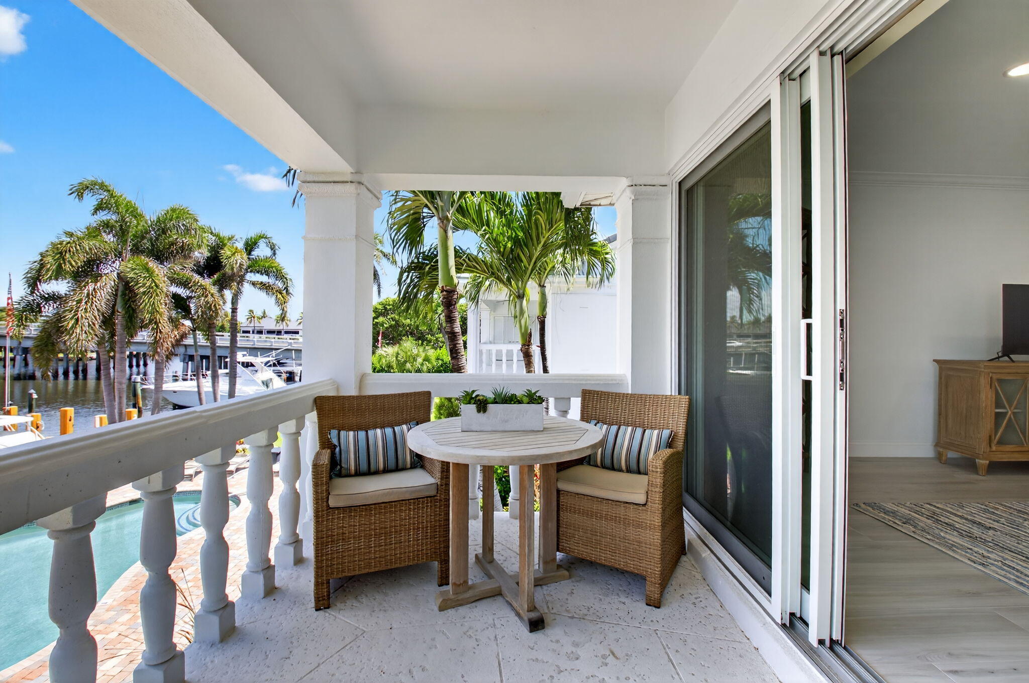 1710 South Ocean Boulevard, Unit 32 Delray Beach, FL 33483 - Photo 9 of 58 a view of a room with furniture and a potted plant
