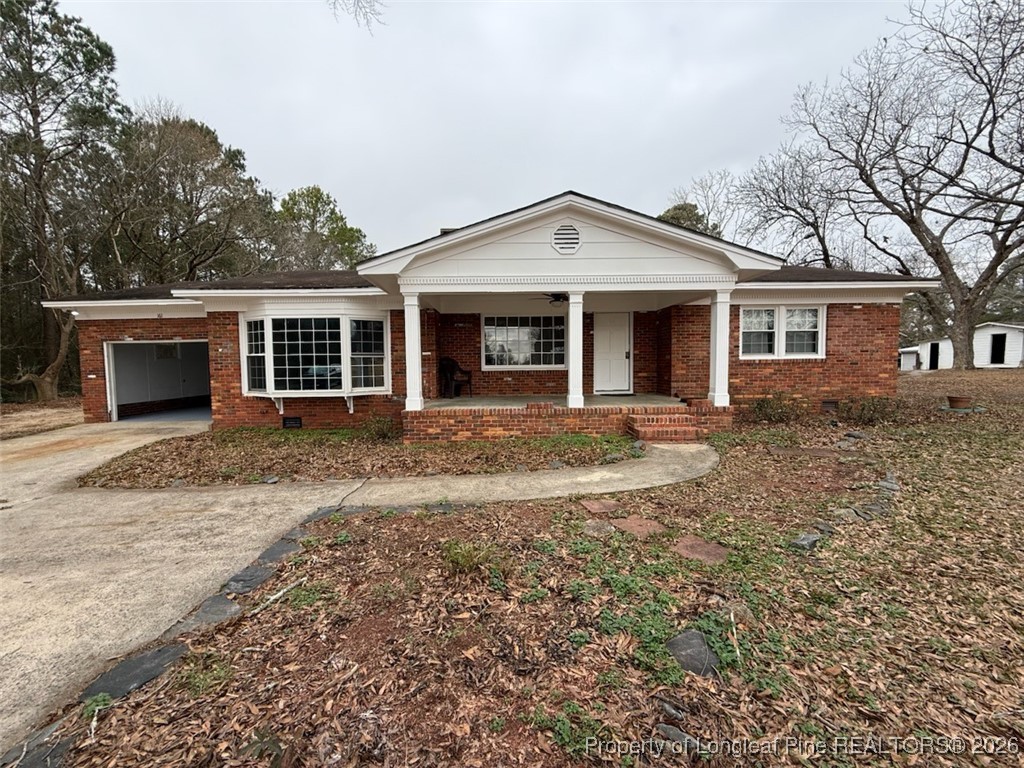 161 Fowler Lane Dunn, NC 28334 - Photo 1 of 12 front view of a house with a yard
