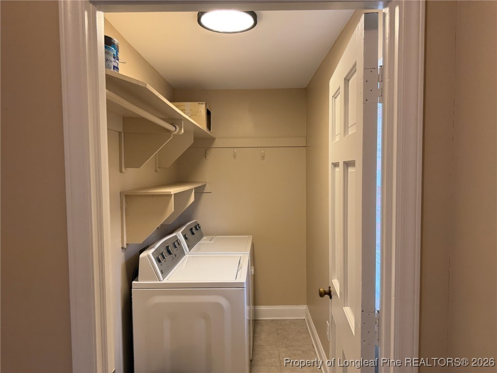 161 Fowler Lane Dunn, NC 28334 - Photo 6 of 12 a utility room with dryer and washer