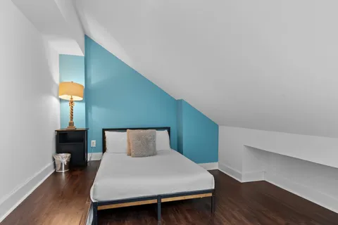 a table and chair sitting in front of a house