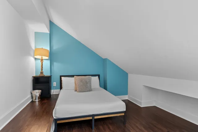 a table and chair sitting in front of a house