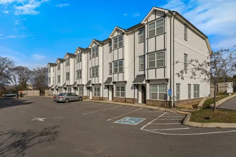 with a glass top table and chairs