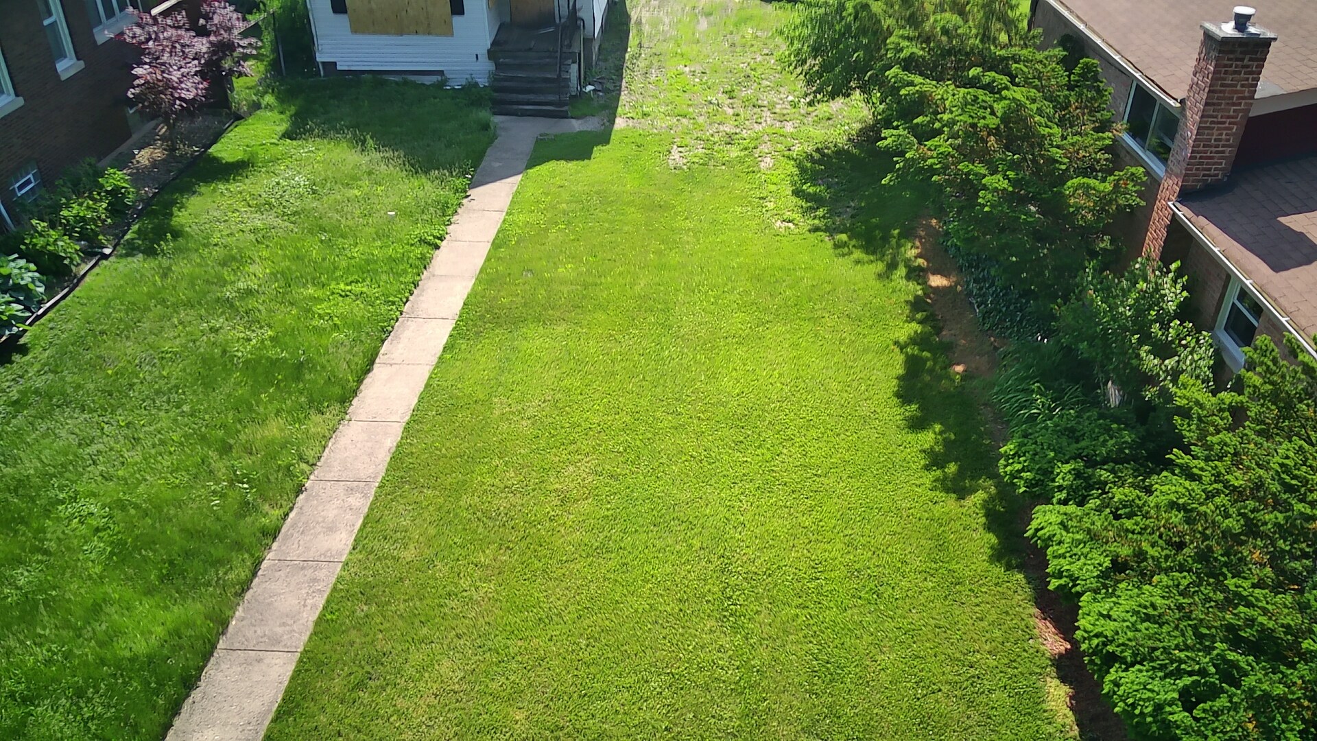 7736 South Indiana Avenue Chicago, IL 60619 - Photo 3 of 7 a view of yard with green space