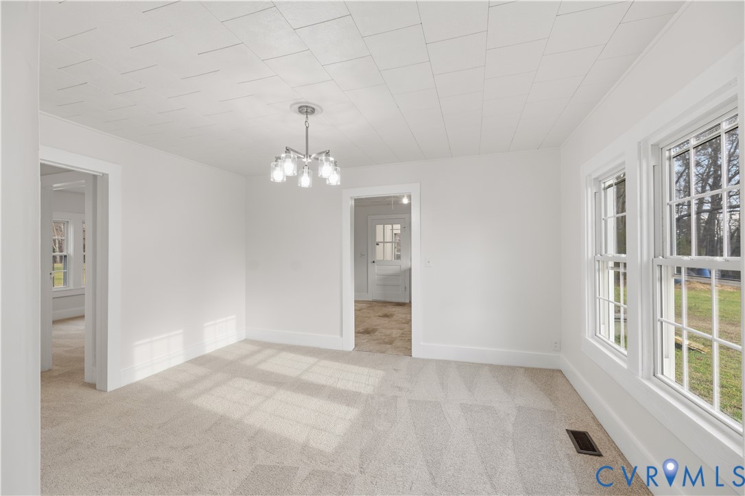 239 Brunswick Road Emporia, VA 23847 - Photo 6 of 22 Dining area featuring ample natural light from mul