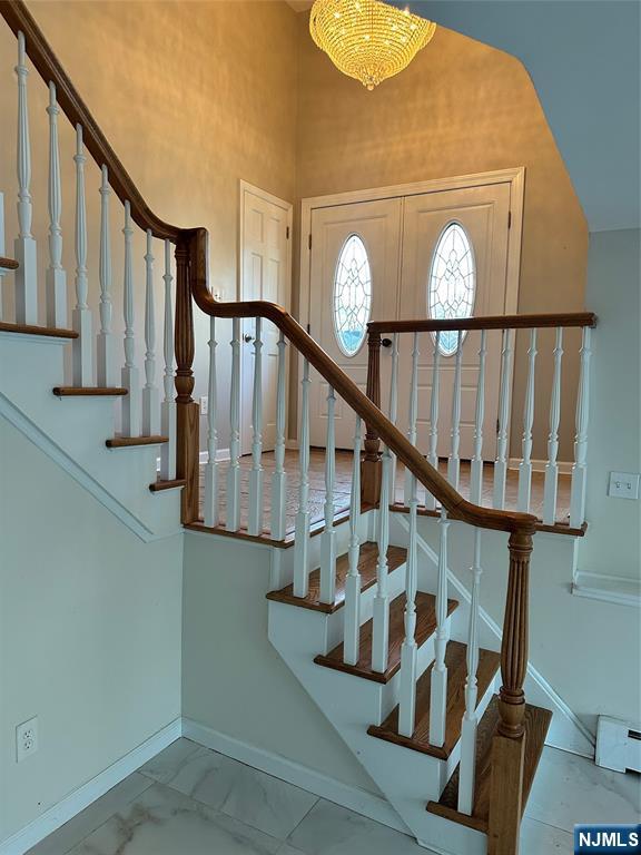 718 Spring Avenue Ridgewood, NJ 07450 - Photo 15 of 20 a view of entryway with wooden floor and a front door
