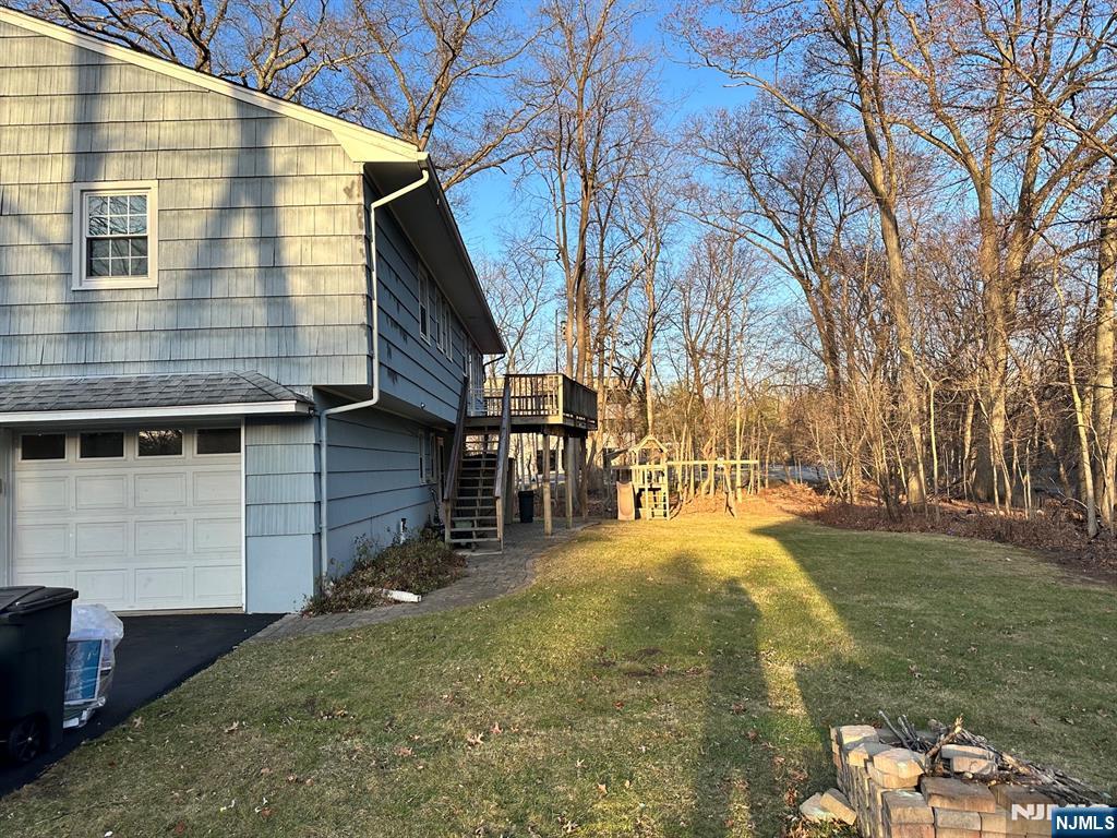 718 Spring Avenue Ridgewood, NJ 07450 - Photo 4 of 20 a view of back yard of the house