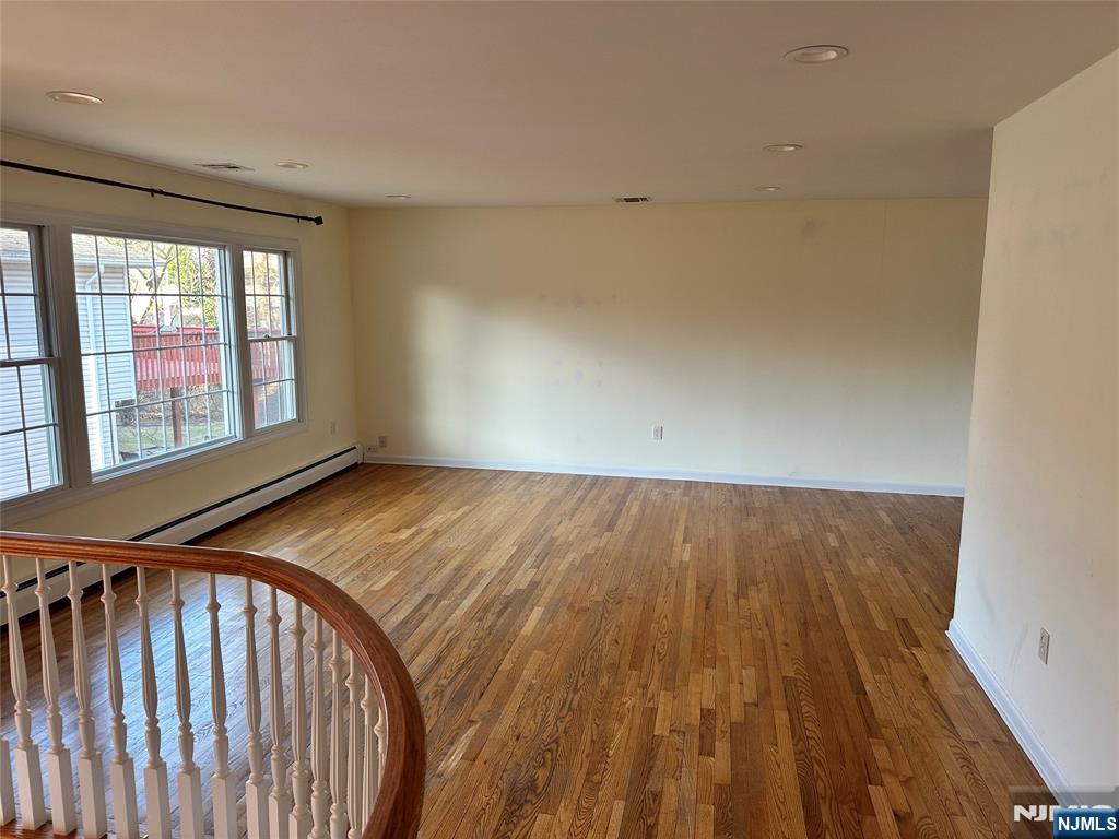 718 Spring Avenue Ridgewood, NJ 07450 - Photo 7 of 20 a view of an empty room and window