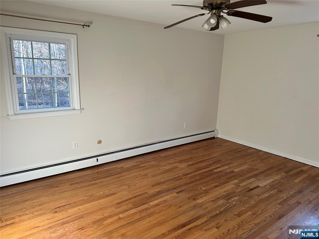 718 Spring Avenue Ridgewood, NJ 07450 - Photo 10 of 20 wooden floor in an empty room