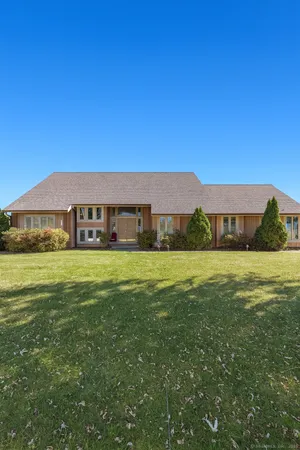 a front view of house with yard