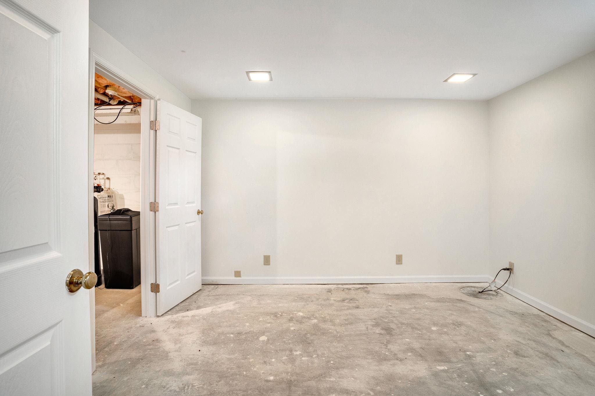 11590 Fort Valley Road Fort Valley, VA 22652 - Photo 30 of 40 an empty room with a refrigerator