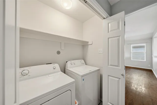 a utility room with dryer and washer
