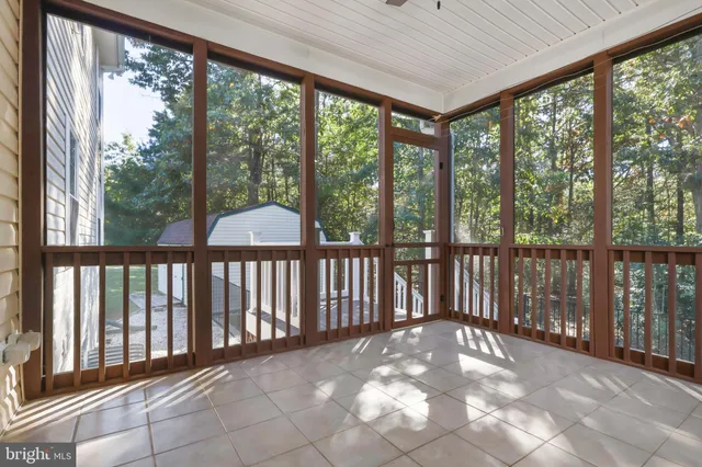a view of a balcony with chairs