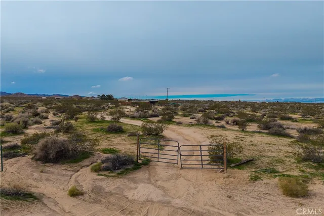an aerial view of residential building and ocean view