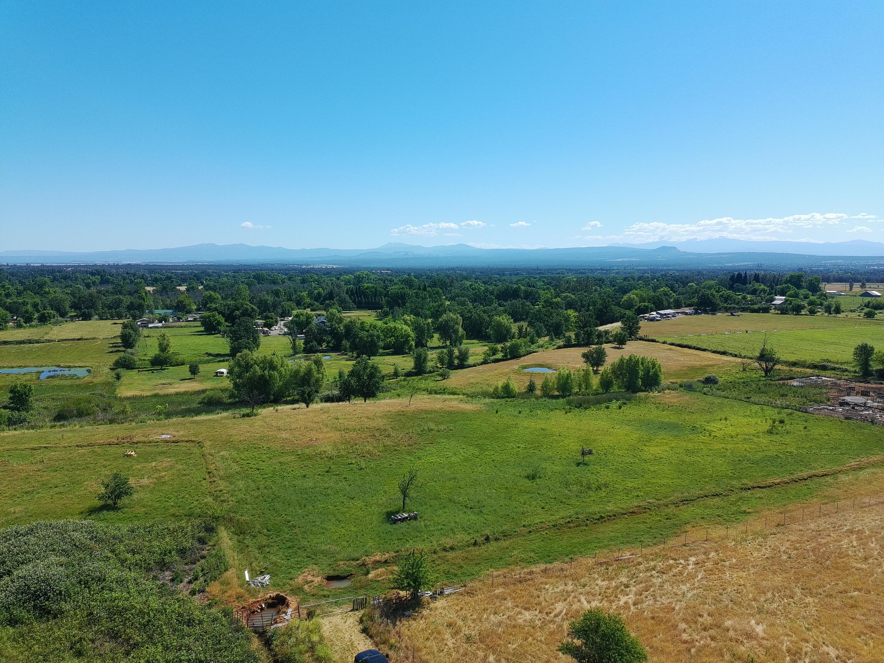 5227 Hopson Road Anderson, CA 96007 - Photo 1 of 19 a view of a field with an ocean