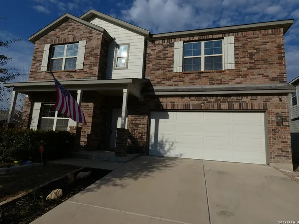 front view of a house with an outdoor space