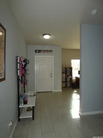 a view of a hallway with workspace