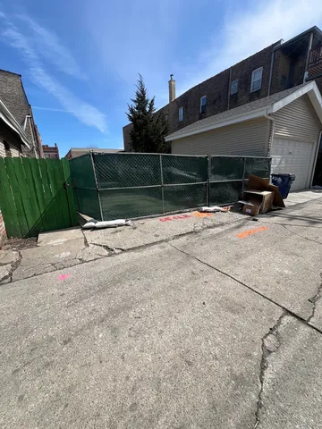 a view of a chair under an umbrella