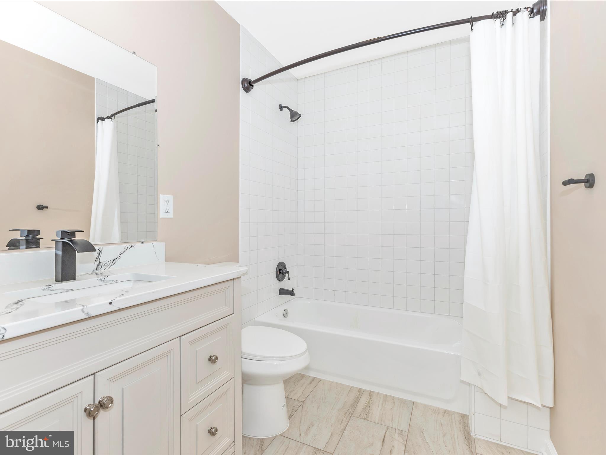 4820 Hayes Street Northeast Washington, DC 20019 - Photo 38 of 52 Hall Bathroom upper level