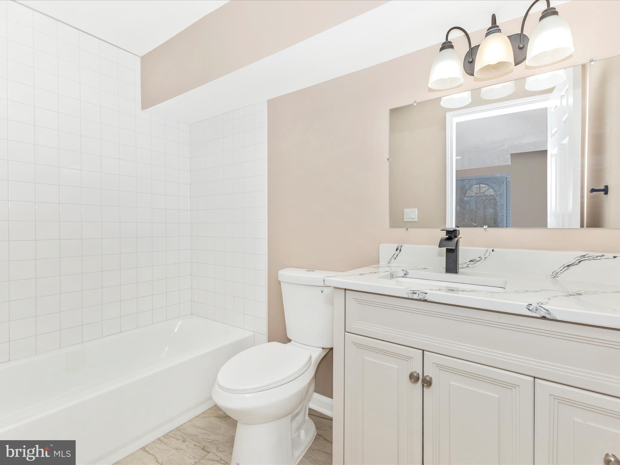 4820 Hayes Street Northeast Washington, DC 20019 - Photo 39 of 52 Hall Bathroom upper level