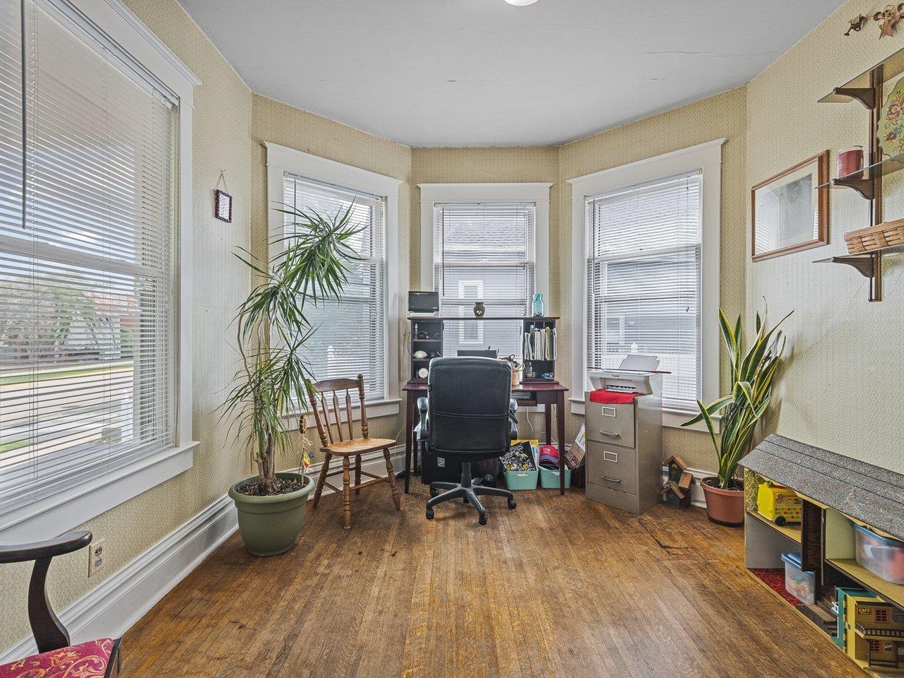 250 Edward Street Sycamore, IL 60178 - Photo 11 of 31 a view of a workspace with furniture and a window