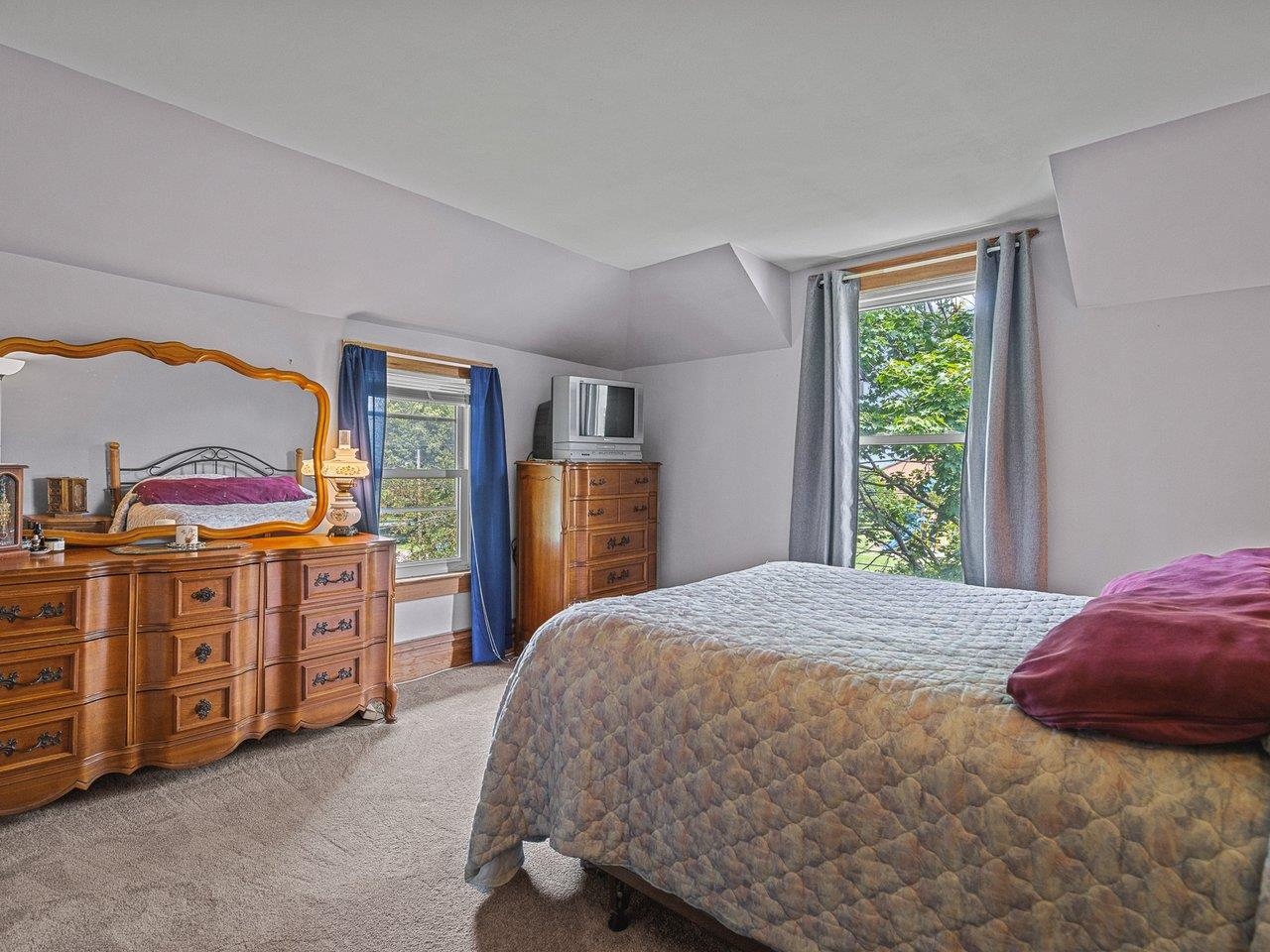 250 Edward Street Sycamore, IL 60178 - Photo 16 of 31 a bedroom with a bed and a dresser