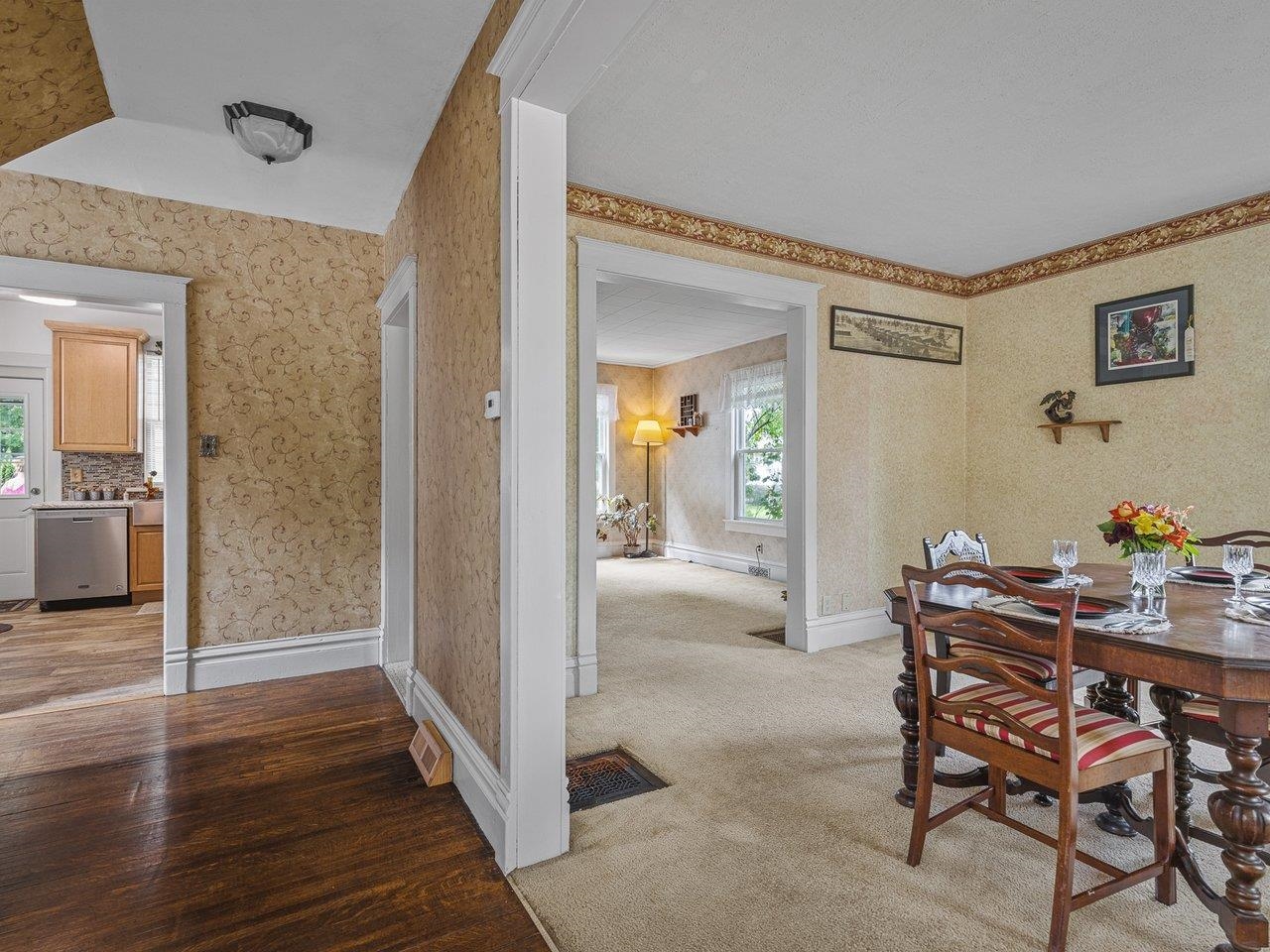 250 Edward Street Sycamore, IL 60178 - Photo 4 of 31 a dining room with furniture and wooden floor
