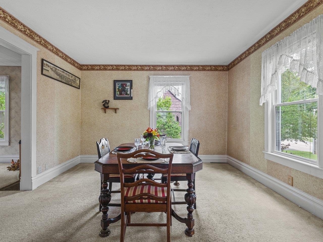 250 Edward Street Sycamore, IL 60178 - Photo 5 of 31 a view of a dining room with furniture and a window
