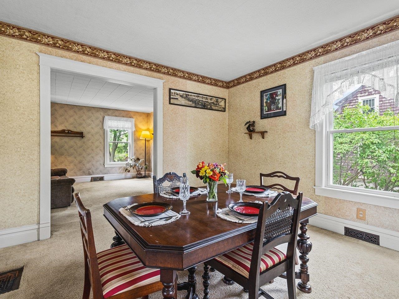 250 Edward Street Sycamore, IL 60178 - Photo 6 of 31 a view of a dining room and livingroom with furniture
