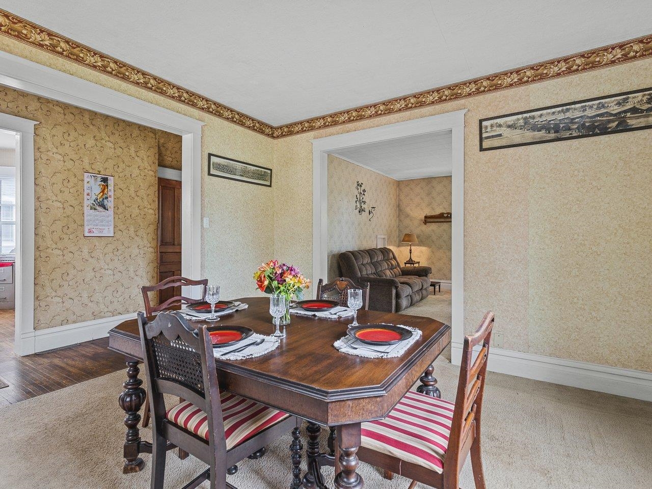 250 Edward Street Sycamore, IL 60178 - Photo 7 of 31 a dining room with furniture and wooden floor