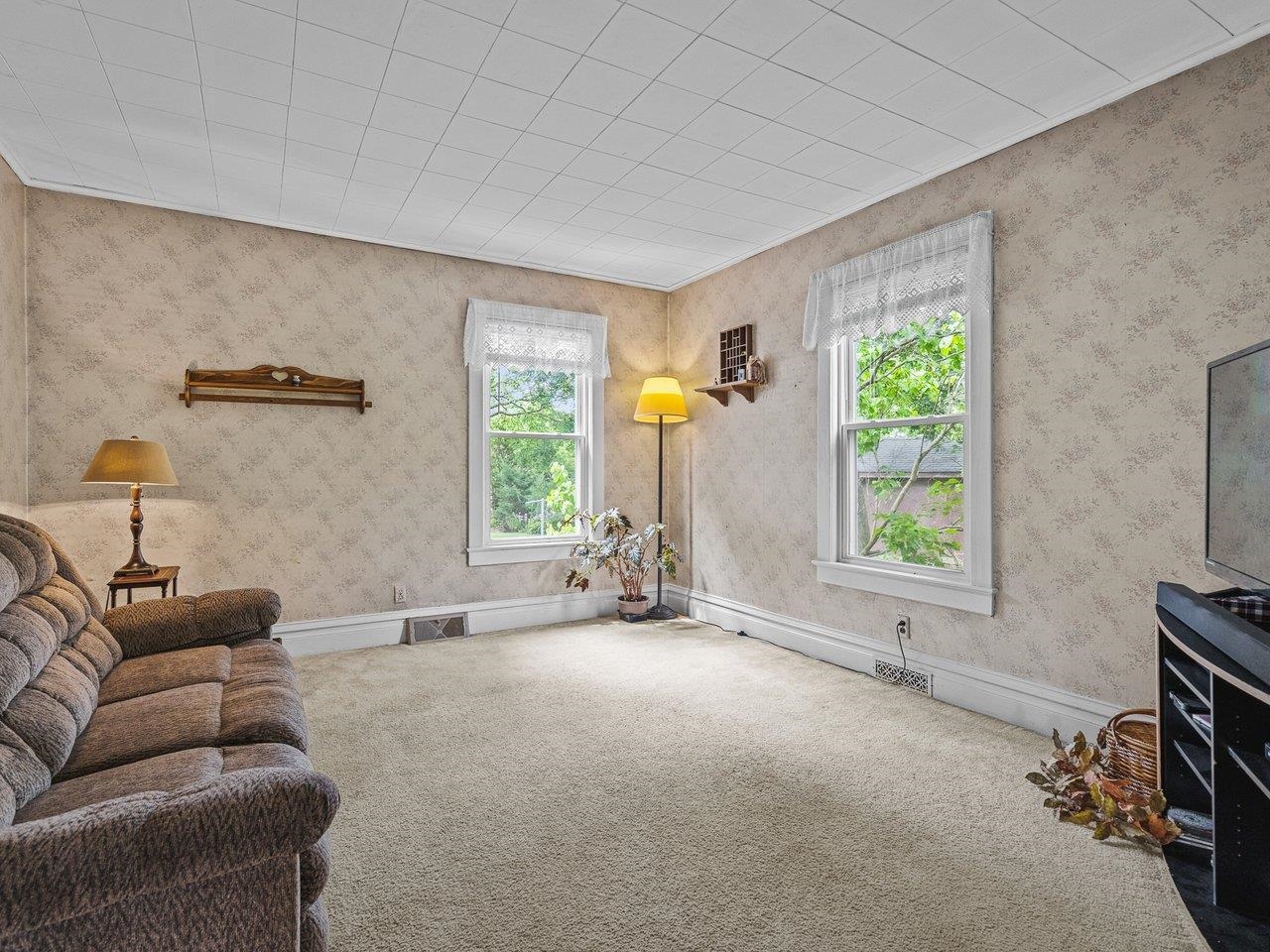 250 Edward Street Sycamore, IL 60178 - Photo 9 of 31 a view of livingroom with furniture and windows
