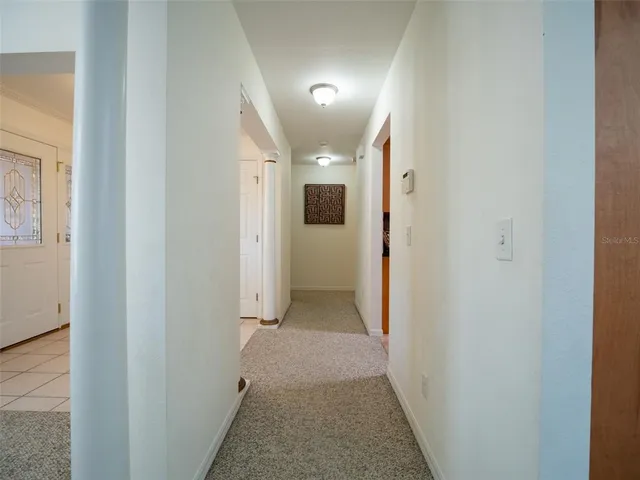 a view of a hallway with painted walls