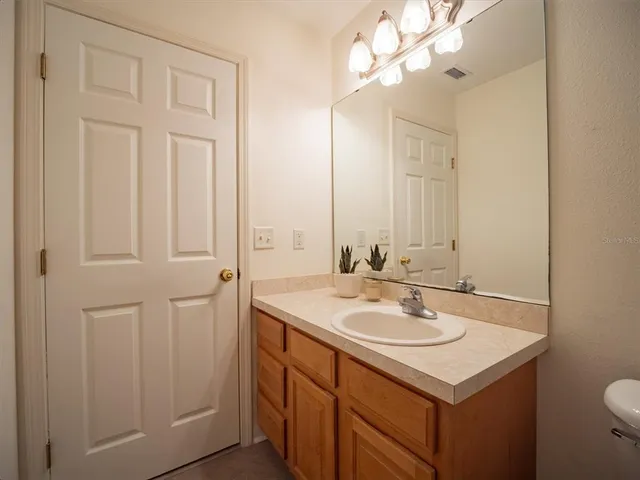 a view of house with backyard porch