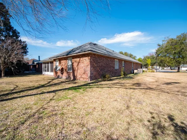 a view of a swimming pool with an outdoor space and seating area