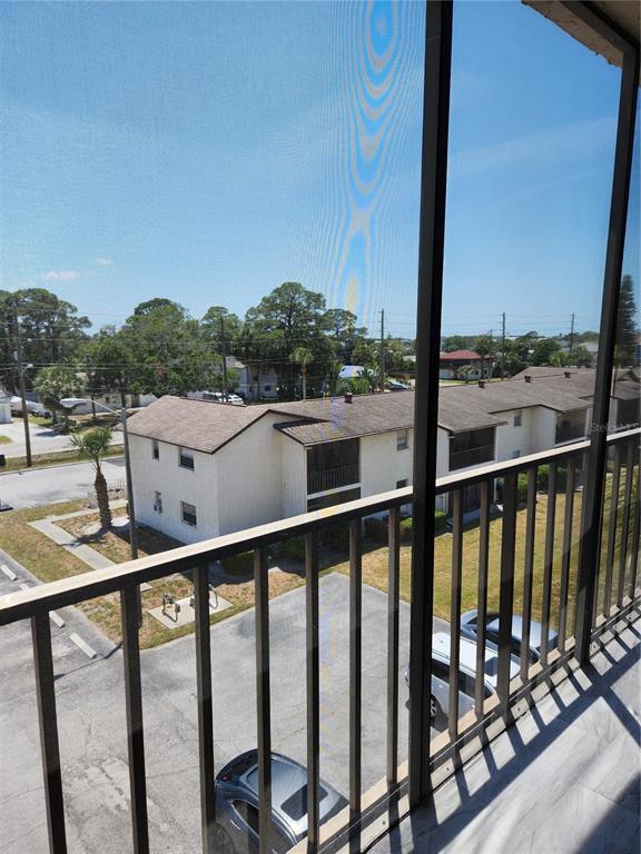 5541 Bay Boulevard, Unit 403 Port Richey, FL 34668 - Photo 7 of 24 a view of city from a balcony