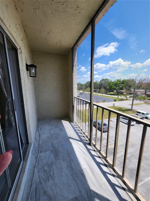 5541 Bay Boulevard, Unit 403 Port Richey, FL 34668 - Photo 8 of 24 a view of a balcony