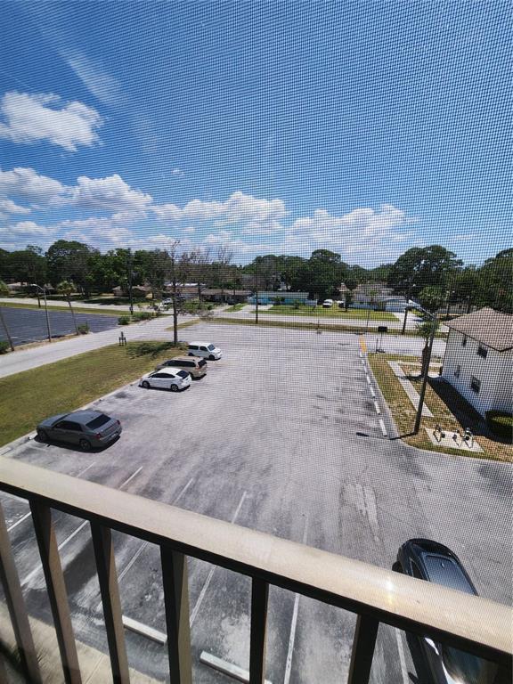 5541 Bay Boulevard, Unit 403 Port Richey, FL 34668 - Photo 9 of 24 a view of a lake with a mountain