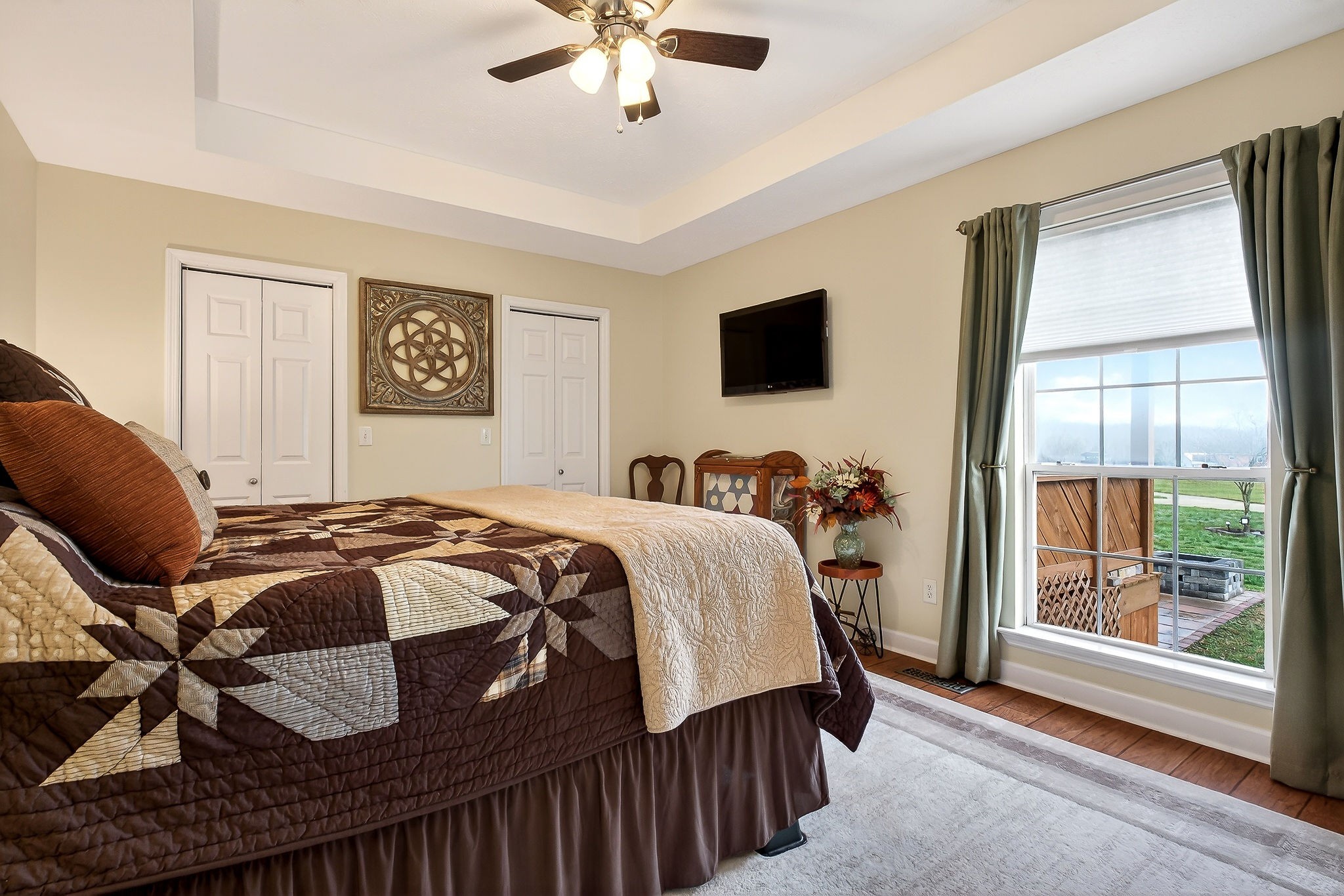 1445 Tom Grissom Road Morrison, TN 37357 - Photo 12 of 42 a bedroom with a bed and glass window