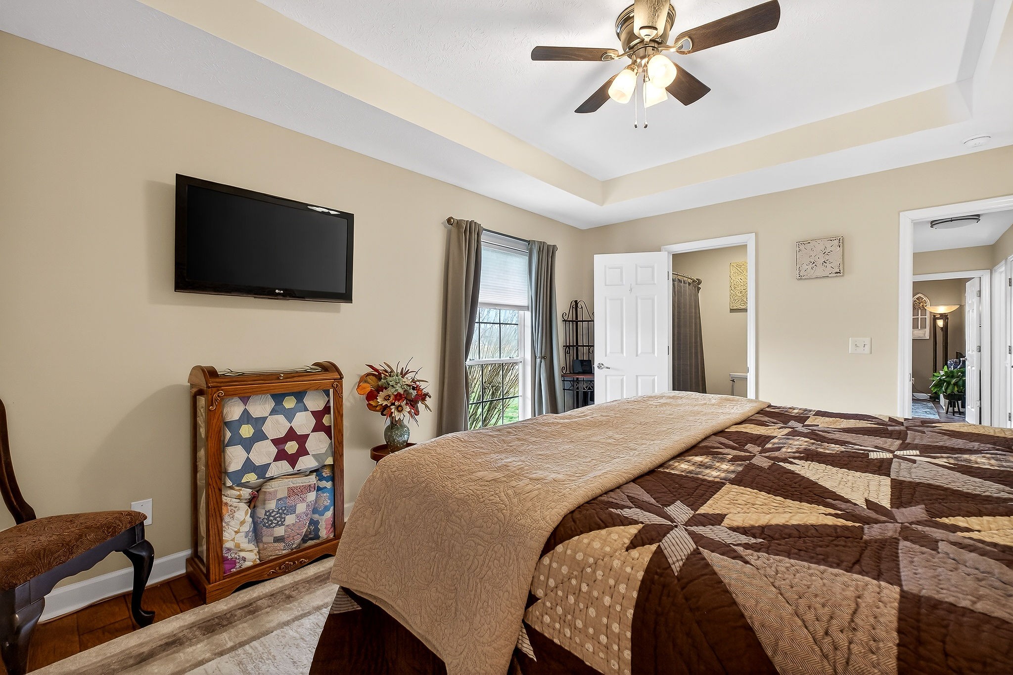 1445 Tom Grissom Road Morrison, TN 37357 - Photo 13 of 42 a bedroom with a bed and a flat screen tv