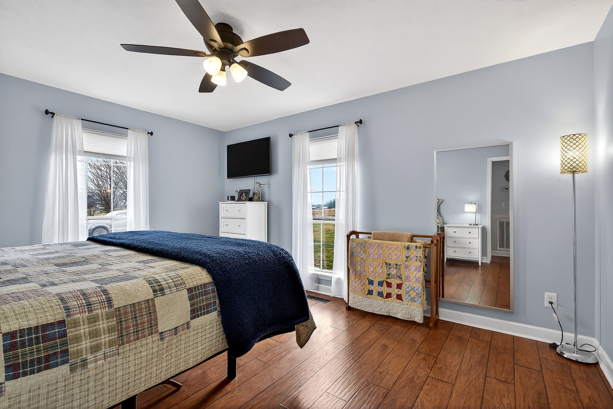 1445 Tom Grissom Road Morrison, TN 37357 - Photo 16 of 42 a bedroom with a bed and a dresser