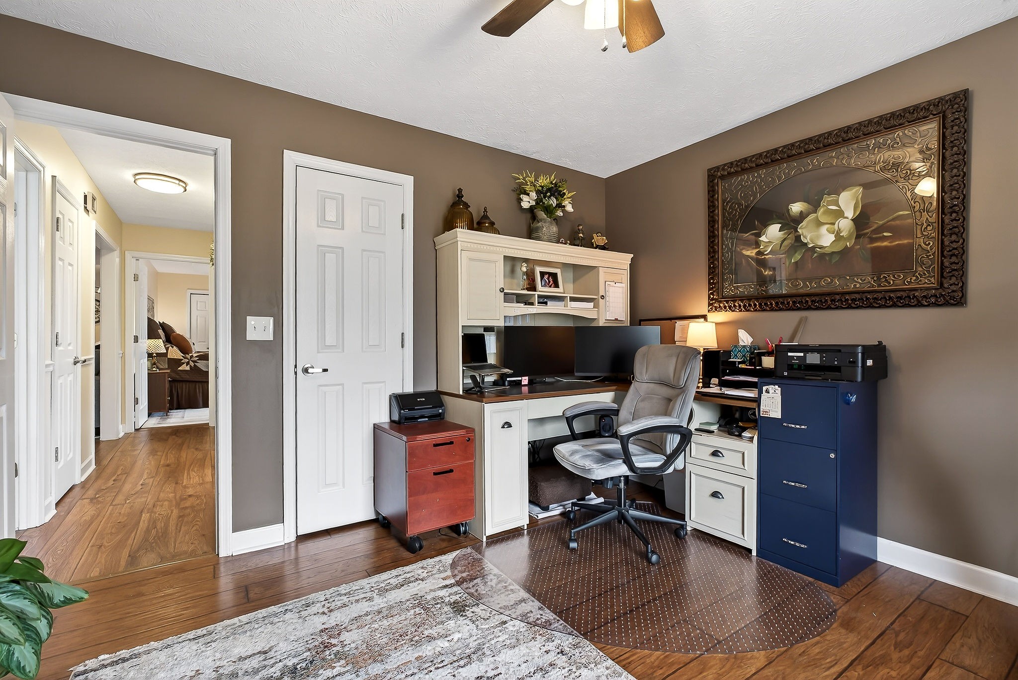 1445 Tom Grissom Road Morrison, TN 37357 - Photo 21 of 42 a workspace with furniture and wooden floor