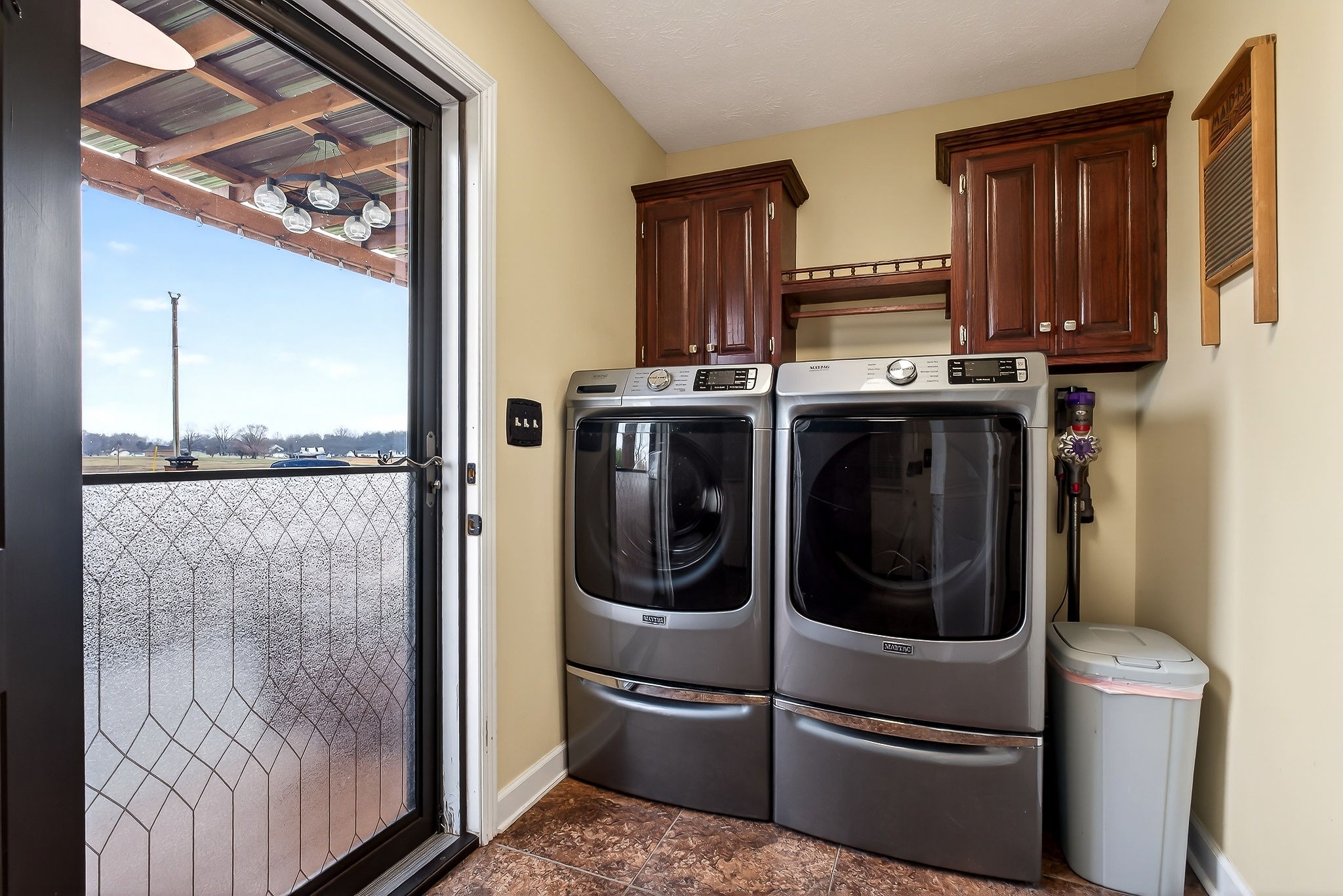 1445 Tom Grissom Road Morrison, TN 37357 - Photo 22 of 42 a kitchen with stainless steel appliances granite countertop a refrigerator and a stove top oven