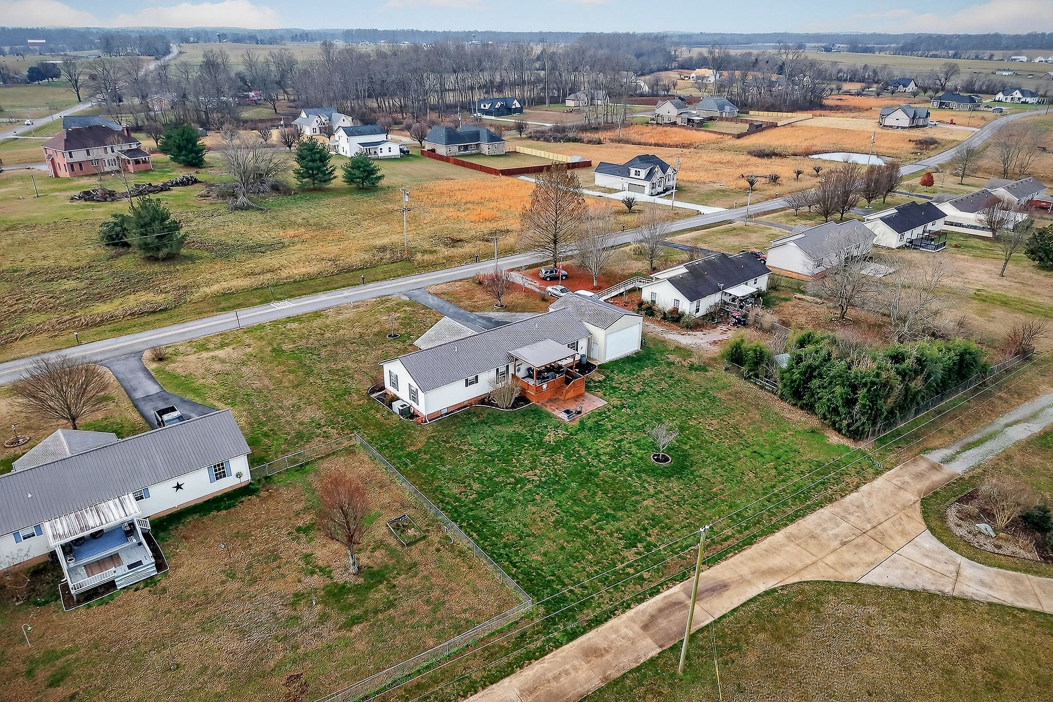 1445 Tom Grissom Road Morrison, TN 37357 - Photo 42 of 42 an aerial view of a house with a yard basket ball court and outdoor seating