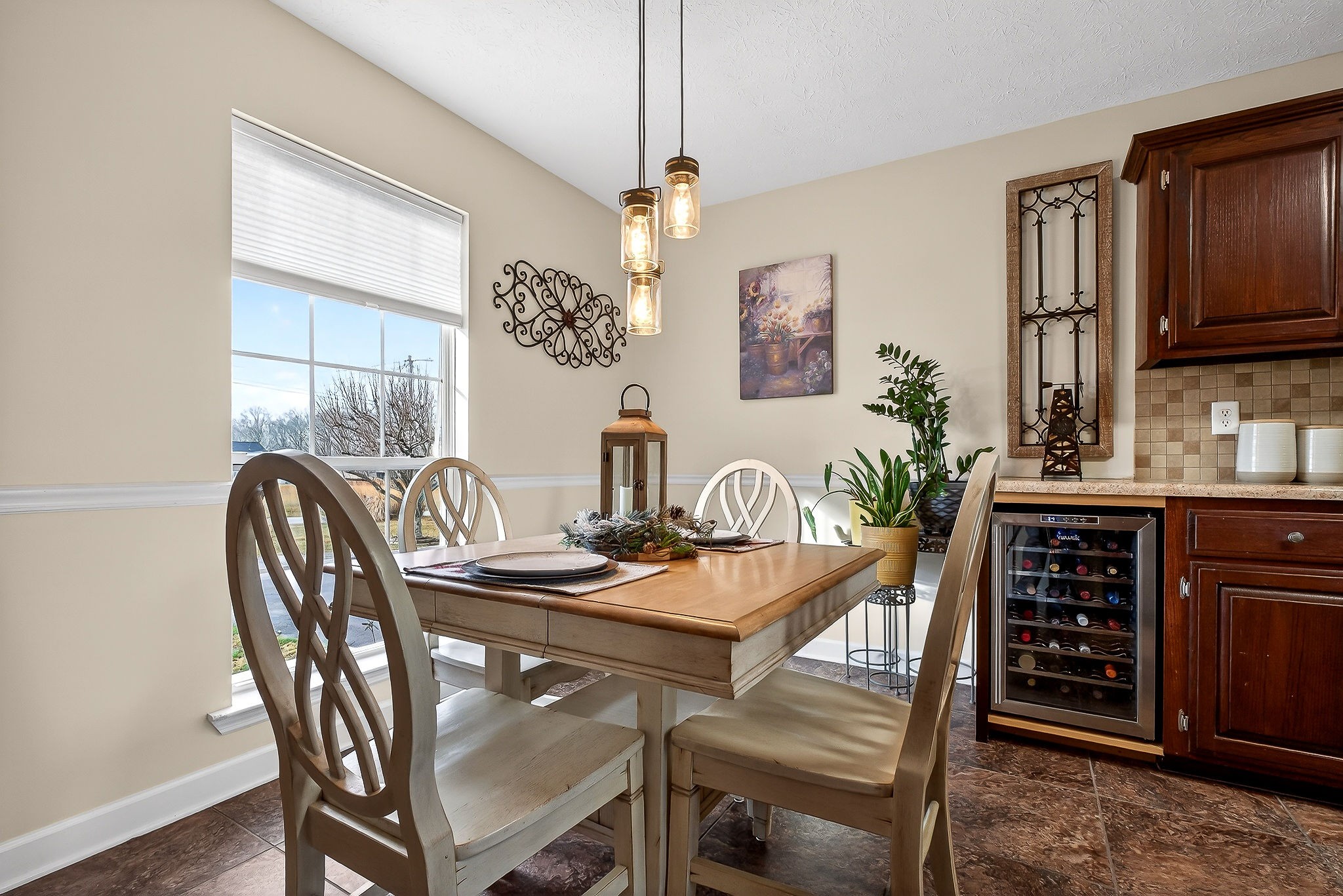 1445 Tom Grissom Road Morrison, TN 37357 - Photo 9 of 42 a dining room with furniture a chandelier and window