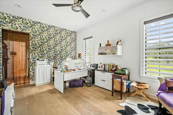 a bathroom with a double vanity sink mirror and toilet