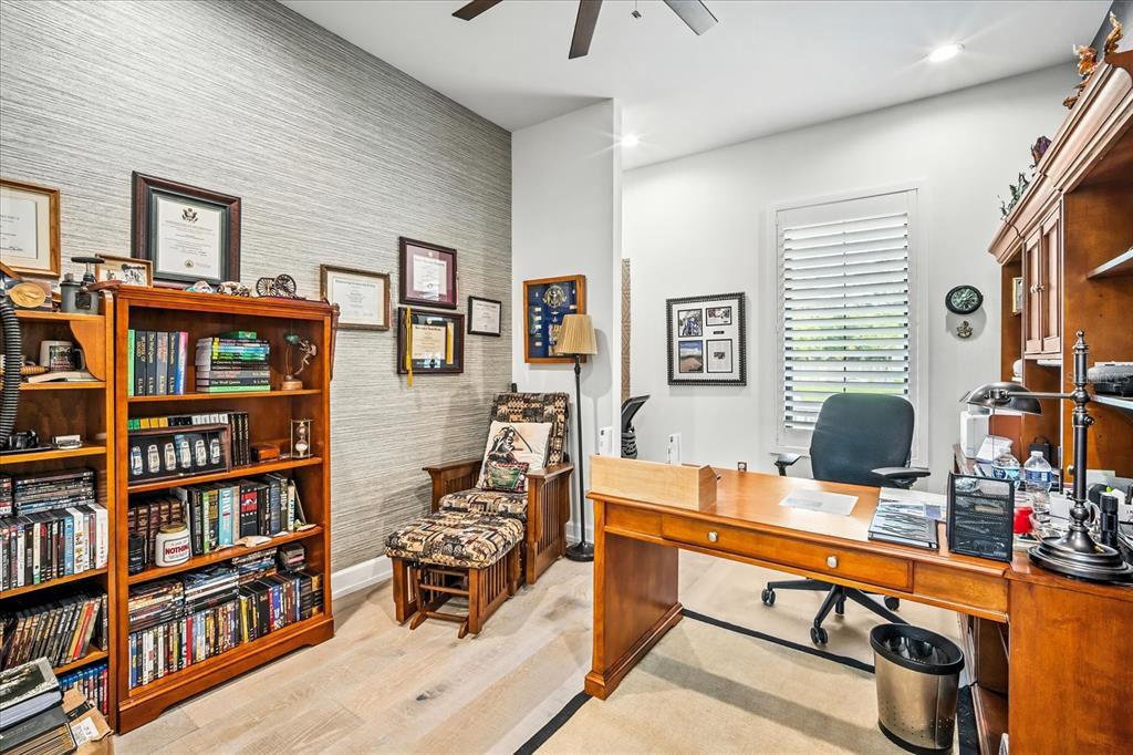 8317 Alafia Pointe Drive Riverview, FL 33578 - Photo 28 of 47 a room with furniture and a book shelf