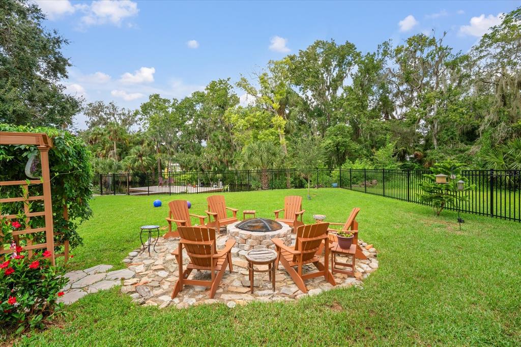 8317 Alafia Pointe Drive Riverview, FL 33578 - Photo 40 of 47 a view of a chairs and table in the garden