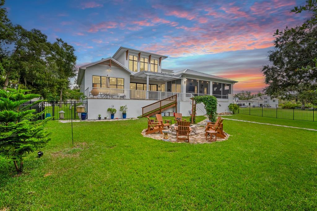 8317 Alafia Pointe Drive Riverview, FL 33578 - Photo 4 of 47 a front view of a house with a yard table and chairs