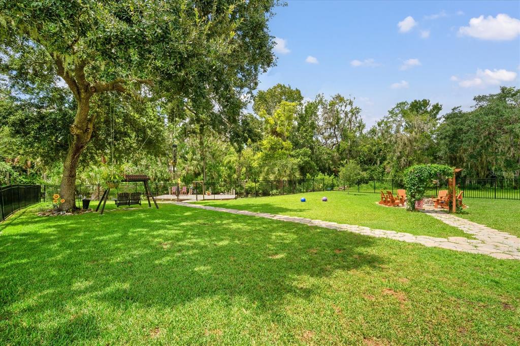 8317 Alafia Pointe Drive Riverview, FL 33578 - Photo 5 of 47 a view of a green field