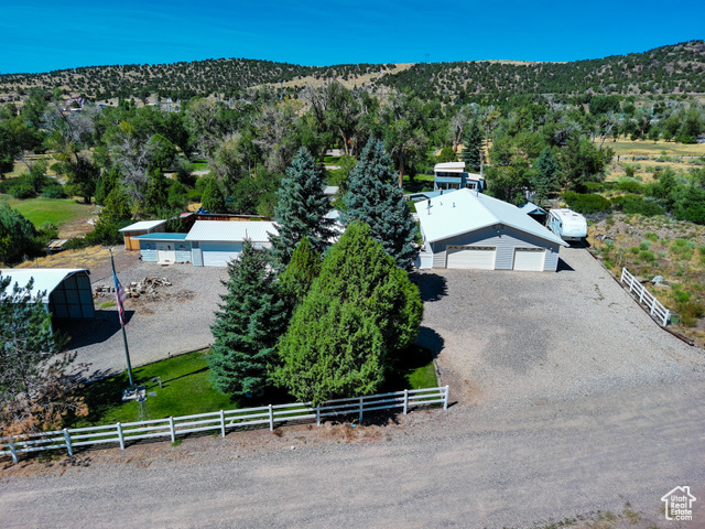 2373 East 190 North Beaver, UT 84713 - Photo 3 of 54 View from above of property featuring a heavily wooded area and a mountainous background