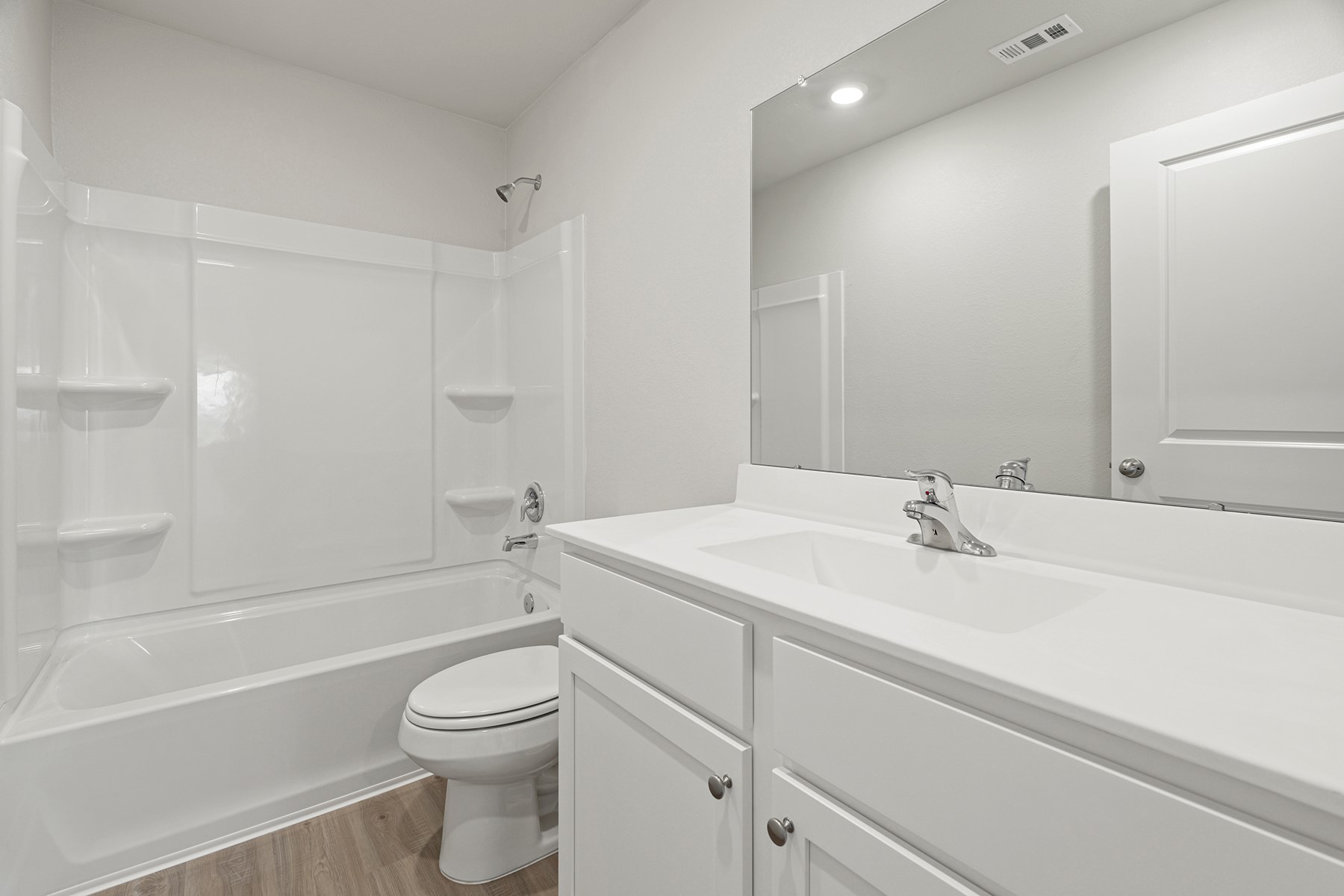 1131 Campside Drive Beasley, TX 77417 - Photo 12 of 15 a bathroom with a sink a toilet and a bathtub